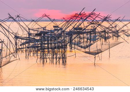 Golden Sky Above Fishing Trap In Pak Pra Talay Noi Sea Phatthalung South Of Thailand