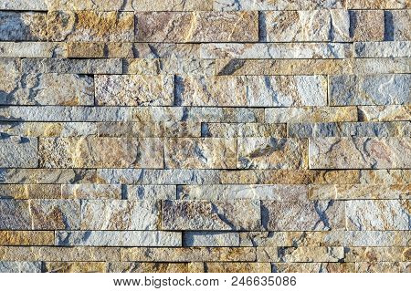 Fragment Of A Wall Made Of Stone. Stone Wall.