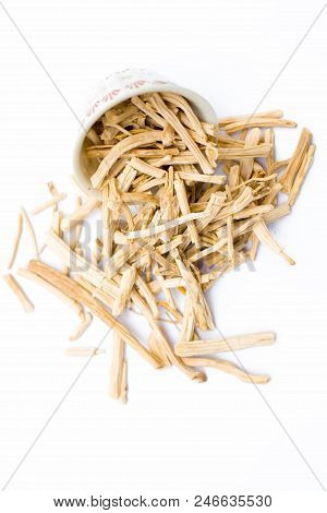 Close Up Of Ayurvedic Herb  Satavari Or Kurilo Or Asparagus Racemosus Isolated On White In A Glass B