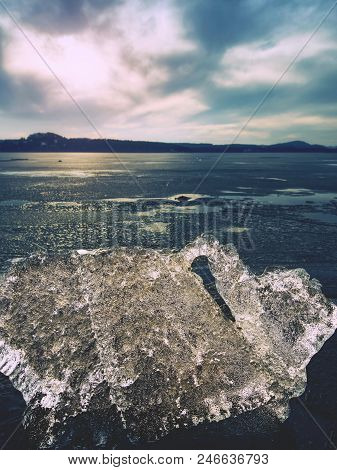 Climate Change. Icy Floes Mealtiing On Beach. Tourist Attraction Disappearing Glaciers. Ice On The B