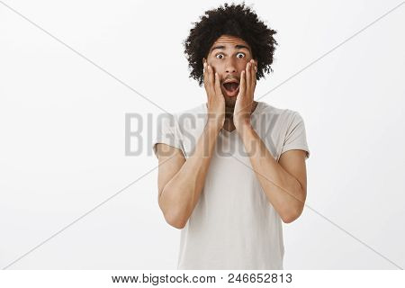 No Way, It Cannot Be Truth. Portrait Of Shocked And Impressed Handsome Male Student With Tanned Skin