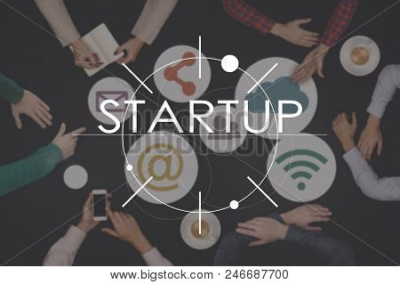 Teamwork Startup Concept - Top View Of Six People. Startup Business Concept On Wooden Table. Blur.