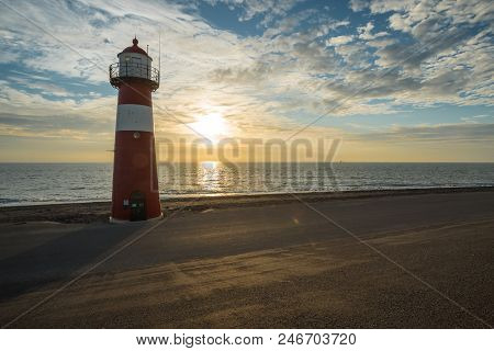 This Lighthouse Is Located In The Netherlands In Westkapelle By The Sea