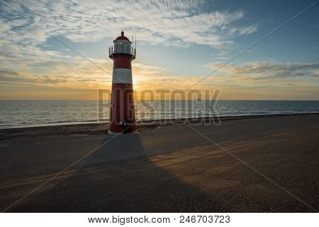 This Lighthouse Is Located In The Netherlands In Westkapelle By The Sea