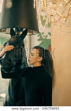 Beauty Fashion Model Girl. Fashion Look. Girl Looks Sexi, Fashionable Indoors. Sexy Girl Standing In