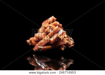 Crocoite Mineral Stone With Reflection In Front Of Black Background, Lead Chromate
