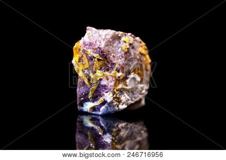 Wulfenite On A Purple Bedrock, Black Background, Molybdate Mineral Gemstone
