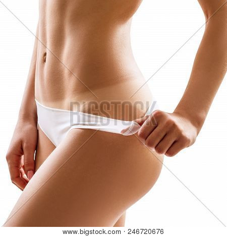 Perfect Female Buttocks With Trail Of Sunburn. Isolated On White Background.