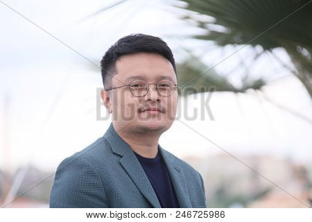 Director Gan Bi attends the photocall for 'Long Day's Journey Into Night (Di Qui Zui Hou De Ye Wan)' during the 71 Cannes Film Festival at Palais des Festivals on May 16, 2018 in Cannes, France. 