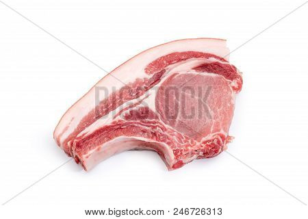 Uncooked Pork Loin Chop With Rib On A White Background