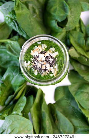 Green Smoothie In Jar, Overhead On Glass, Healthy Drink With Vegetable Leaves, Background
