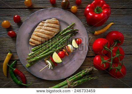 grilled chicken breast with brochette vegetable with grill asparagus