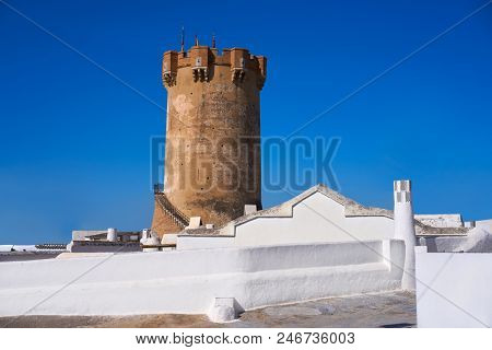 Paterna tower in Valencia and chimneys of underground cave houses