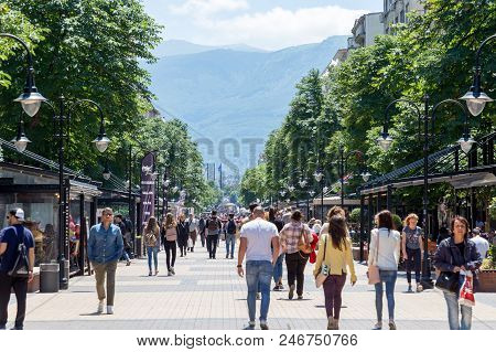 Sofia, Bulgaria - June 23: People Enjoy The Sunny Weather Walking Through The Pedestrian Street Vito
