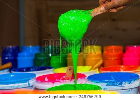 Blue Color Of Plastisol Ink In White Plastic Barrel. Plastisol Ink Is Specially For Print On Tee Shi