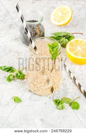 Natural Energy Drink, Chia Fresca, Infused Water Or Lemonade On Grey Stone Table Copy Space