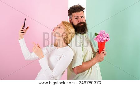 Sharing Happy Selfie. Woman Capturing Happy Moment Boyfriend Bring Bouquet Flowers. Couple In Love B