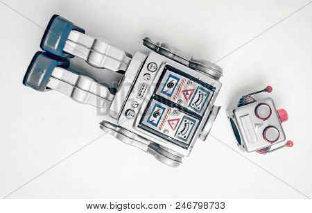 vintage bot lost his head on white from above 