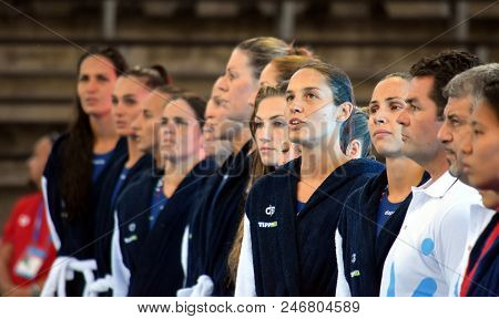 Budapest, Hungary - Jul 16, 2017. Hungarian women waterpolo team listen the national anthem, GANGL Edina in focus. FINA Waterpolo World Championship was held in Alfred Hajos Swimming Centre.