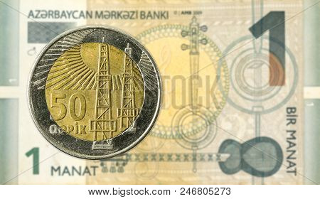 50 Azerbaijani Qepik Coin Against 1 Azerbaijani Manat Bank Note