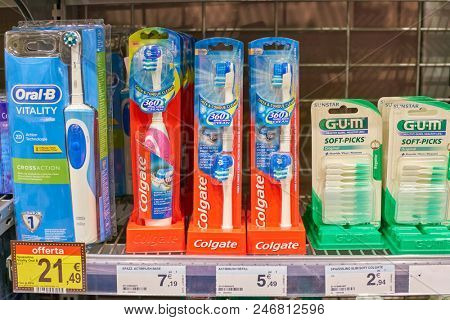 MILAN, ITALY - CIRCA NOVEMBER, 2017: assortment of tooth brush on display for sale at Carrefour Express in Milan.