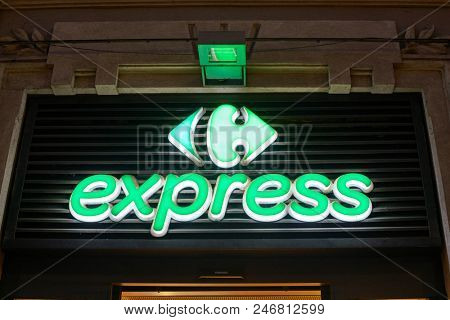 MILAN, ITALY - CIRCA NOVEMBER, 2017: Carrefour Express brand name over a shop entrance in Milan.