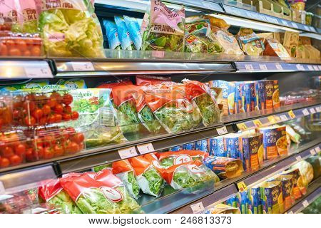 MILAN, ITALY - CIRCA NOVEMBER, 2017: assortment of food on display for sale at Carrefour Express in Milan.
