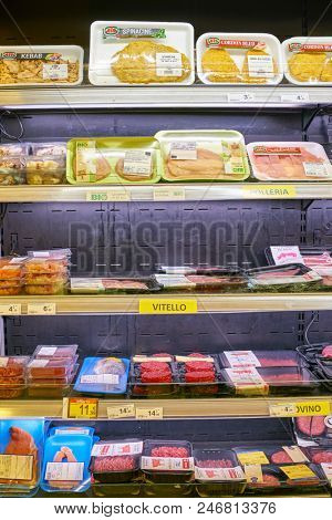 MILAN, ITALY - CIRCA NOVEMBER, 2017: assortment of meat and fish on display for sale at Carrefour Express in Milan.