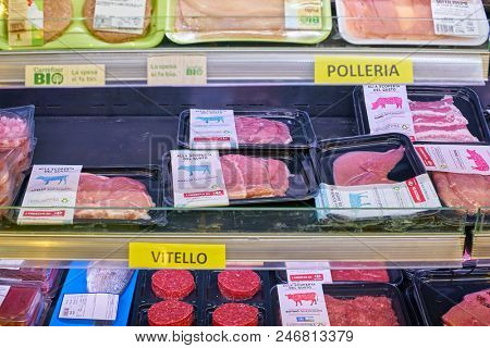 MILAN, ITALY - CIRCA NOVEMBER, 2017: assortment of meat products on display for sale at Carrefour Express in Milan.