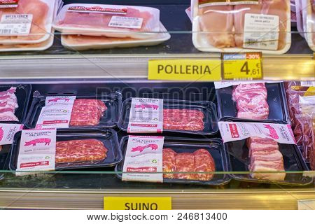 MILAN, ITALY - CIRCA NOVEMBER, 2017: assortment of meat products on display for sale at Carrefour Express in Milan.