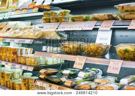 MILAN, ITALY - CIRCA NOVEMBER, 2017: assortment of food on display for sale at Carrefour Express in Milan.