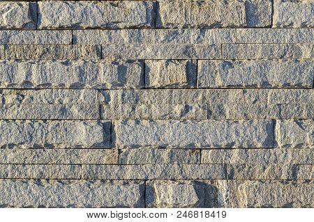 Fragment Of A Wall Made Of Stone. Stone Wall.