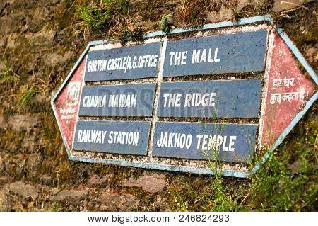 Stone Sign Showing The Directions To The Major Landmarks And Places To Vist In Shimla. Mounted On A 