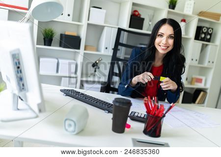 Portrait Of A Young Girl In A Suit. Beautiful Girl Is Working In The Office.