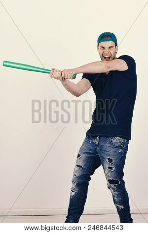 Player With Wild Face Plays Baseball. Sports And Baseball Training Concept. Man With Bristle In Gree