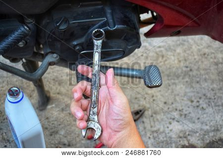Wrench And Pliers For Motorcycle Repair With Morning Light