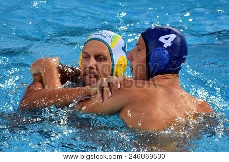 Budapest, Hungary - Jul 17, 2017. ZALANKI Gergo (HUN) waterpolo player (in blue) fights with HOLLIS Lachlan (AUS). FINA Waterpolo World Championship was held in Alfred Hajos Swimming Centre.