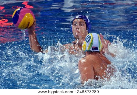 Budapest, Hungary - Jul 17, 2017. ERDELYI Balazs (HUN) waterpolo player (in blue) fights with FANNON James (AUS). FINA Waterpolo World Championship was held in Alfred Hajos Swimming Centre.