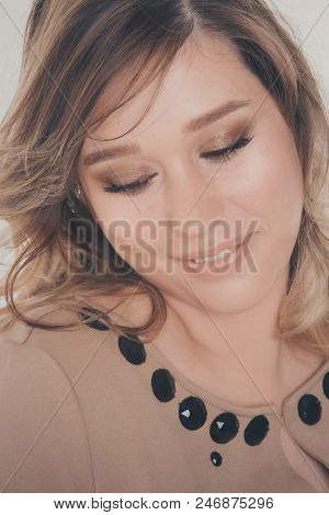 Portrait: Face Of Woman On A White Background