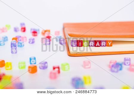 Library Word On Colorful Bead Block As Bookmark In Book. Knowledge From Book Resource In Library Con