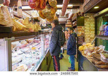 MILAN, ITALY - CIRCA NOVEMBER, 2017: assortment of cheese and meat products on display in shop in Milan.