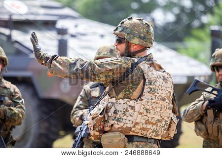 Feldkirchen / Germany - June 9, 2018: German Soldier Instructs Soldiers On A Open Day On Day Of The 