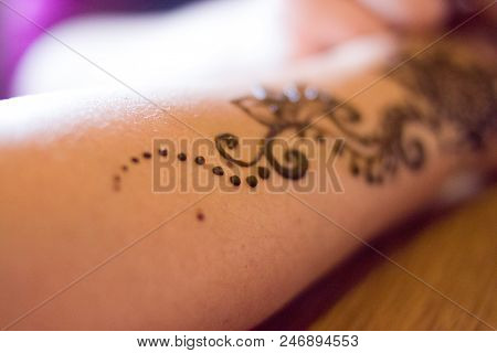 Drawing Process Of Henna Menhdi Ornament On Woman's Hand. Beauty Concept