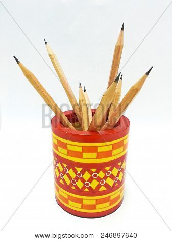Pencils Wooden In The Colorful Box On White Back Ground.