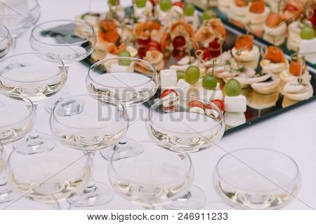 Hard Tasty Cheese On A Plate. Festive Snack And Drink