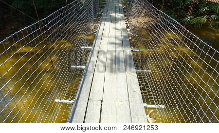 Hanging Bridge Through The Tropical Forest In Lingkungan Village,beaufort,sabah Borneo,malaysia.