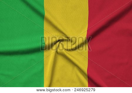 Mali Flag  Is Depicted On A Sports Cloth Fabric With Many Folds. Sport Team Waving Banner