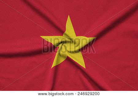 Vietnam Flag  Is Depicted On A Sports Cloth Fabric With Many Folds. Sport Team Waving Banner