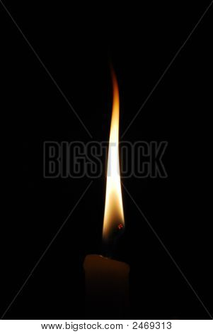 Flamme fra et stearinlys