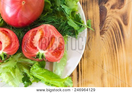 Fresh Tomatoes With Lettuce On A Plate, Organic Healthy And Natural Food